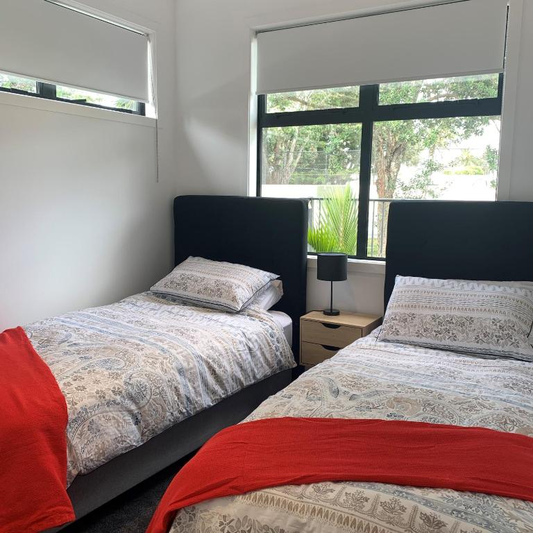 Postel nebo postele na pokoji v ubytování De la Plage Residences