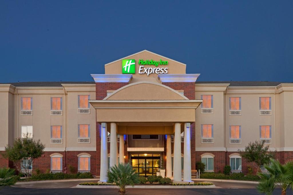 a hotel with a sign on the front of a building at Holiday Inn Express San Angelo, an IHG Hotel in San Angelo