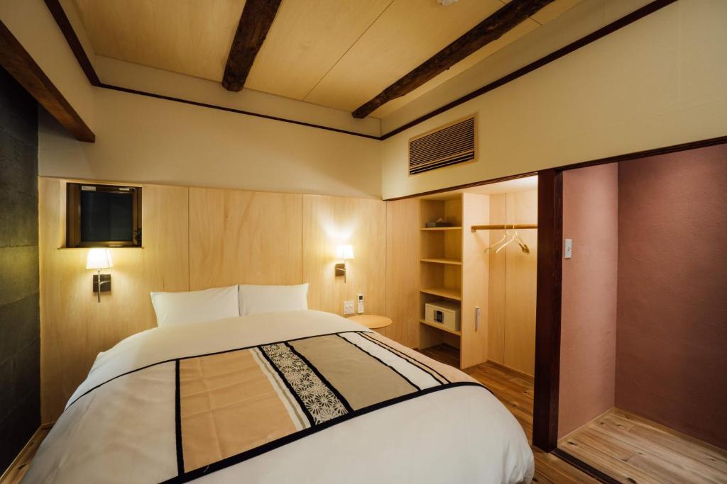 Postel nebo postele na pokoji v ubytování MINKA Riverside Villas