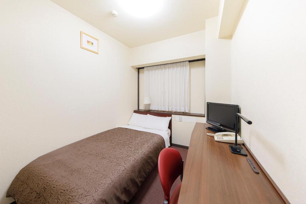 TV a/nebo společenská místnost v ubytování Dai-ni Sunny Stone Hotel