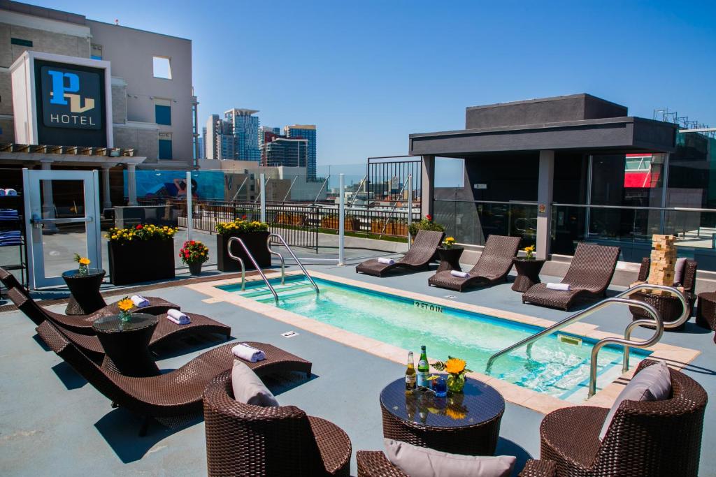 a pool on the roof of a building at Porto Vista Hotel In Little Italy in San Diego