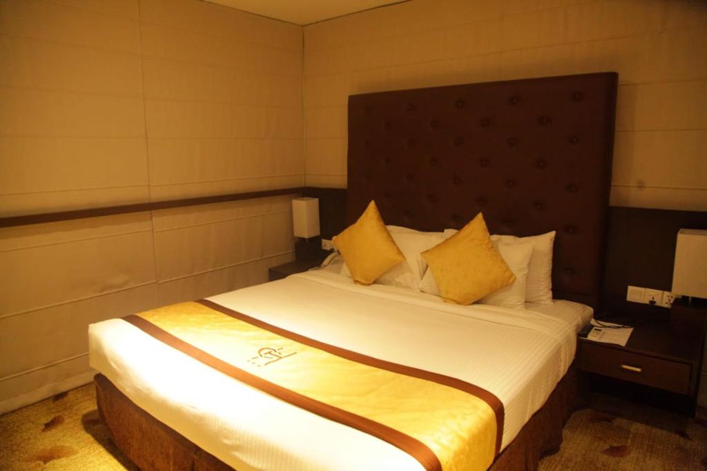 Postel nebo postele na pokoji v ubytování City Hotel Colombo 02