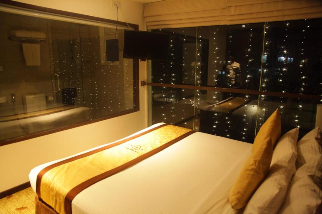 Postel nebo postele na pokoji v ubytování City Hotel Colombo 02