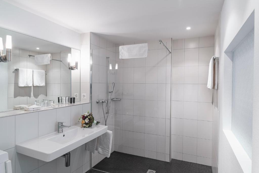 Koupelna v ubytování Weisses Rössli Swiss Quality Hotel