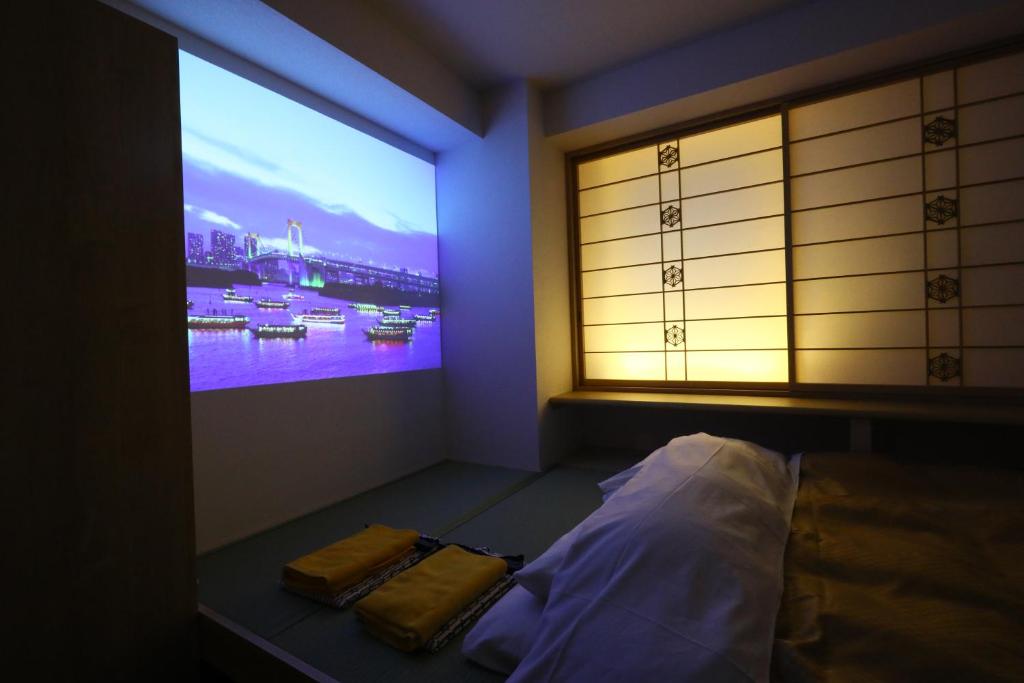 Postel nebo postele na pokoji v ubytování Wa Style Tokyo
