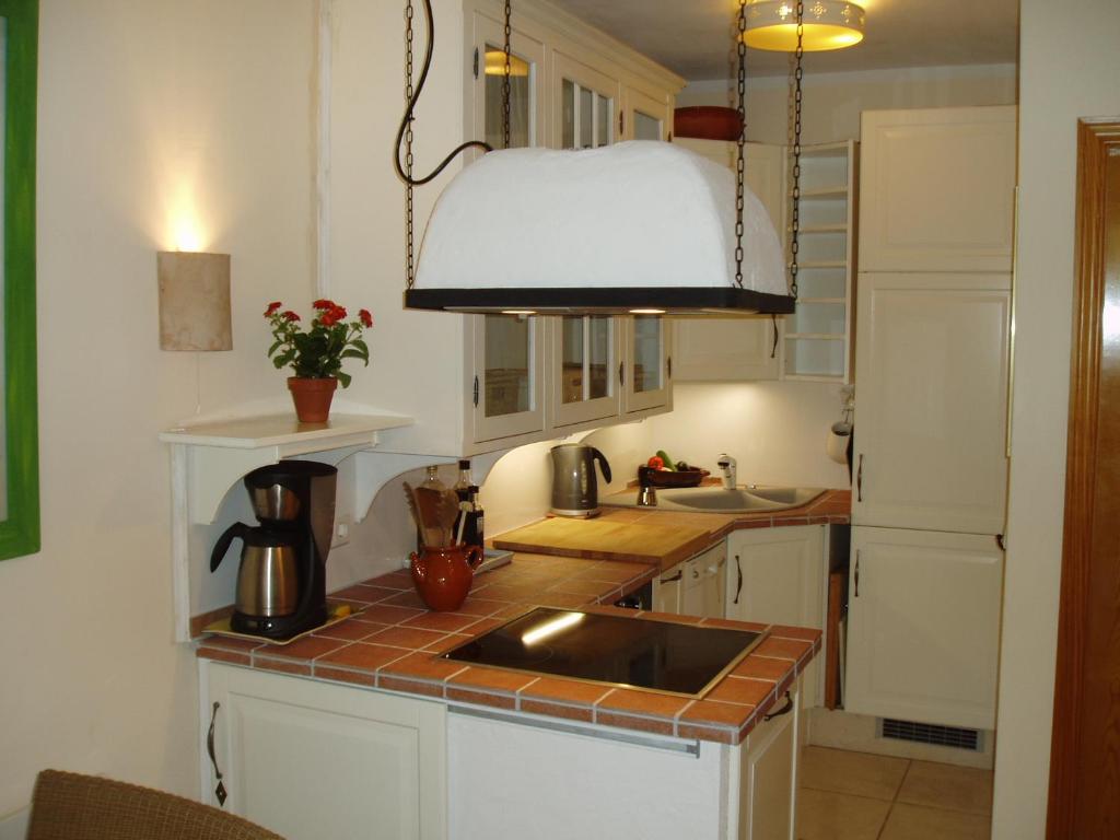 A kitchen or kitchenette at carpe Diem