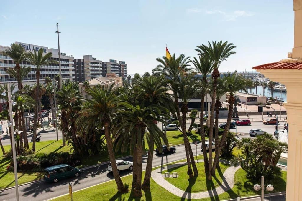 a view of a city with palm trees and a street at SEA VIEW CENTRAL BEACH in Alicante