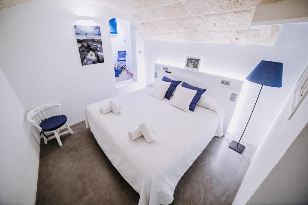 Postel nebo postele na pokoji v ubytování Petit Hotel 5 Fars