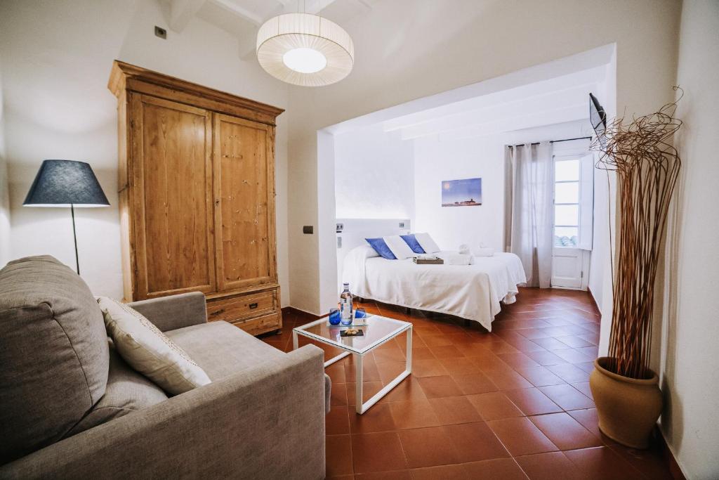Postel nebo postele na pokoji v ubytování Petit Hotel 5 Fars