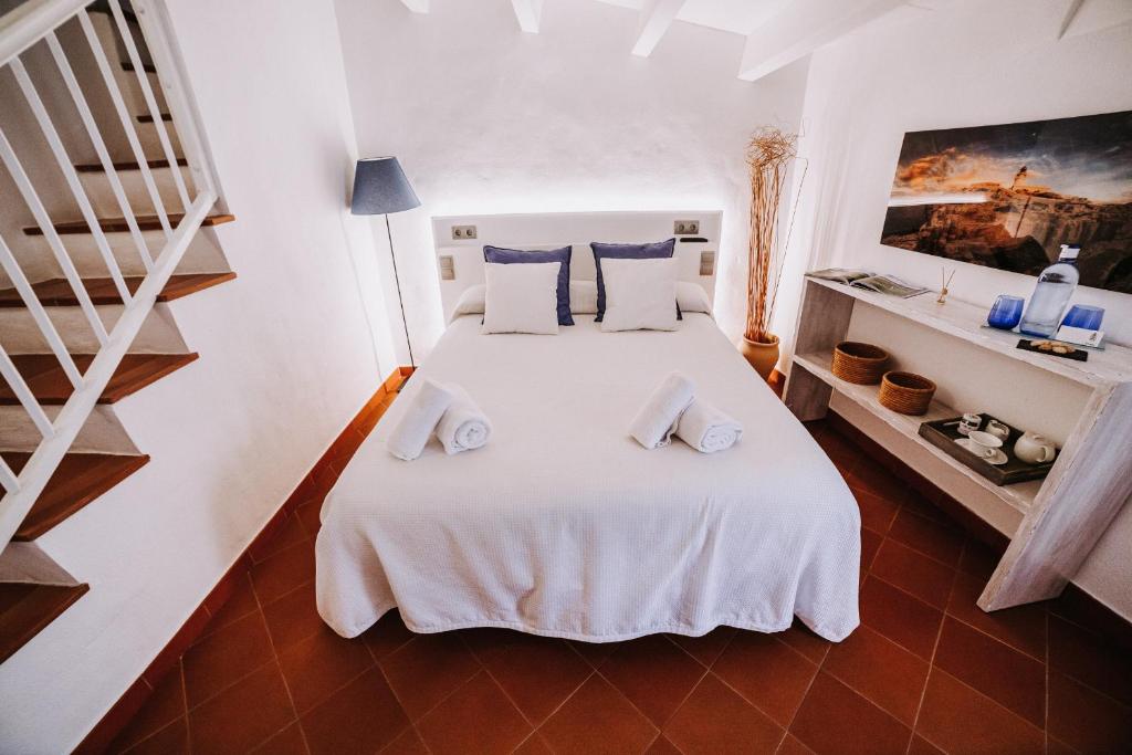 Postel nebo postele na pokoji v ubytování Petit Hotel 5 Fars