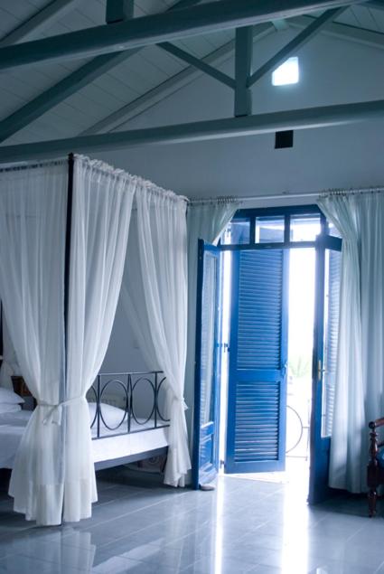 Łóżko lub łóżka w pokoju w obiekcie Villa Ippocampi - Adults Only