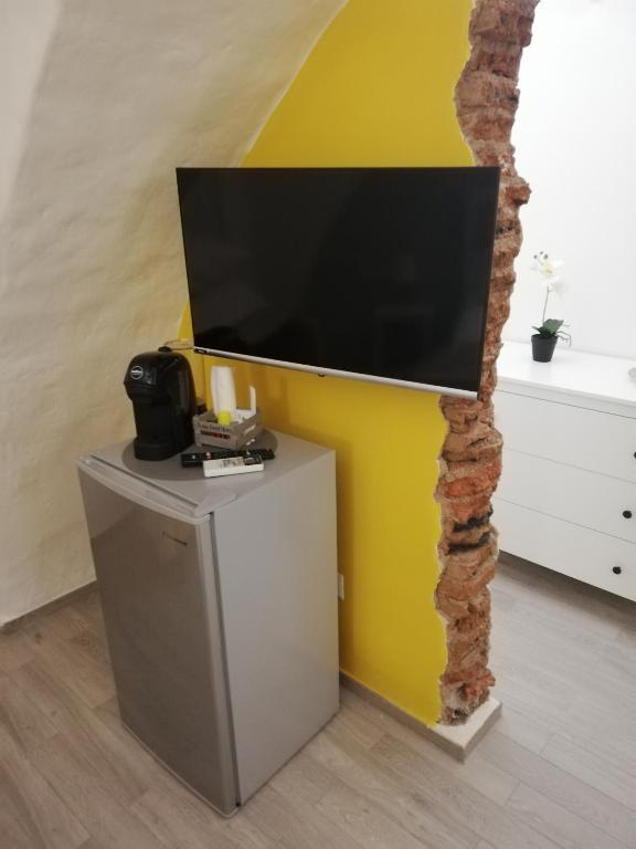 TV a/nebo společenská místnost v ubytování DG Sicily