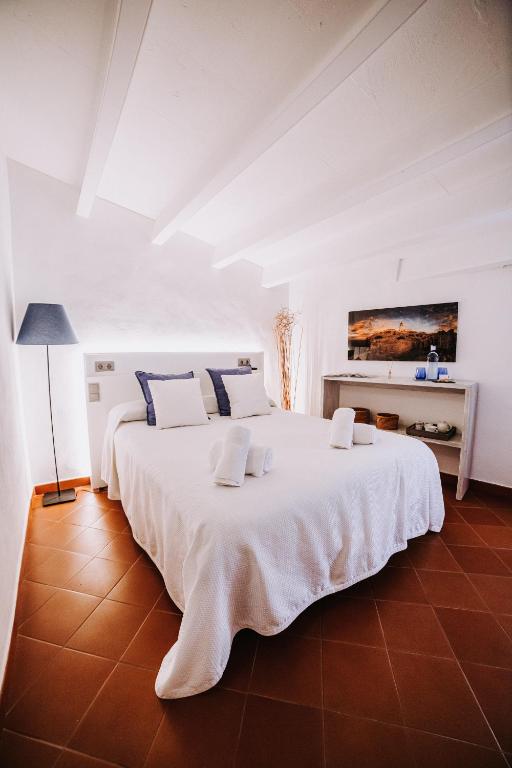 Postel nebo postele na pokoji v ubytování Petit Hotel 5 Fars