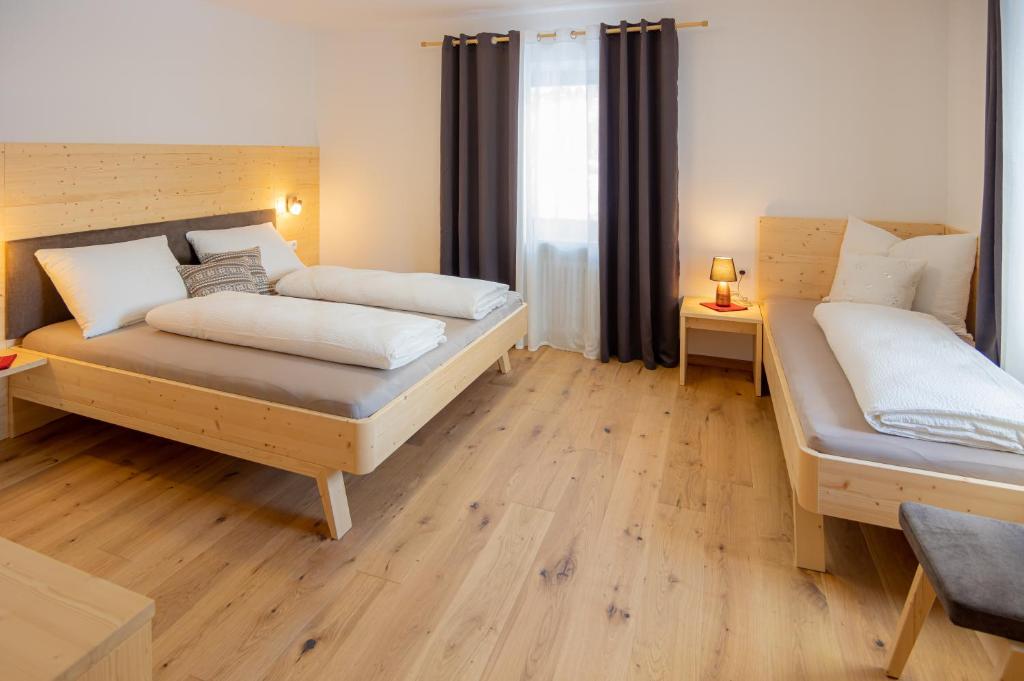 Postel nebo postele na pokoji v ubytování B&B Frühlingsheim