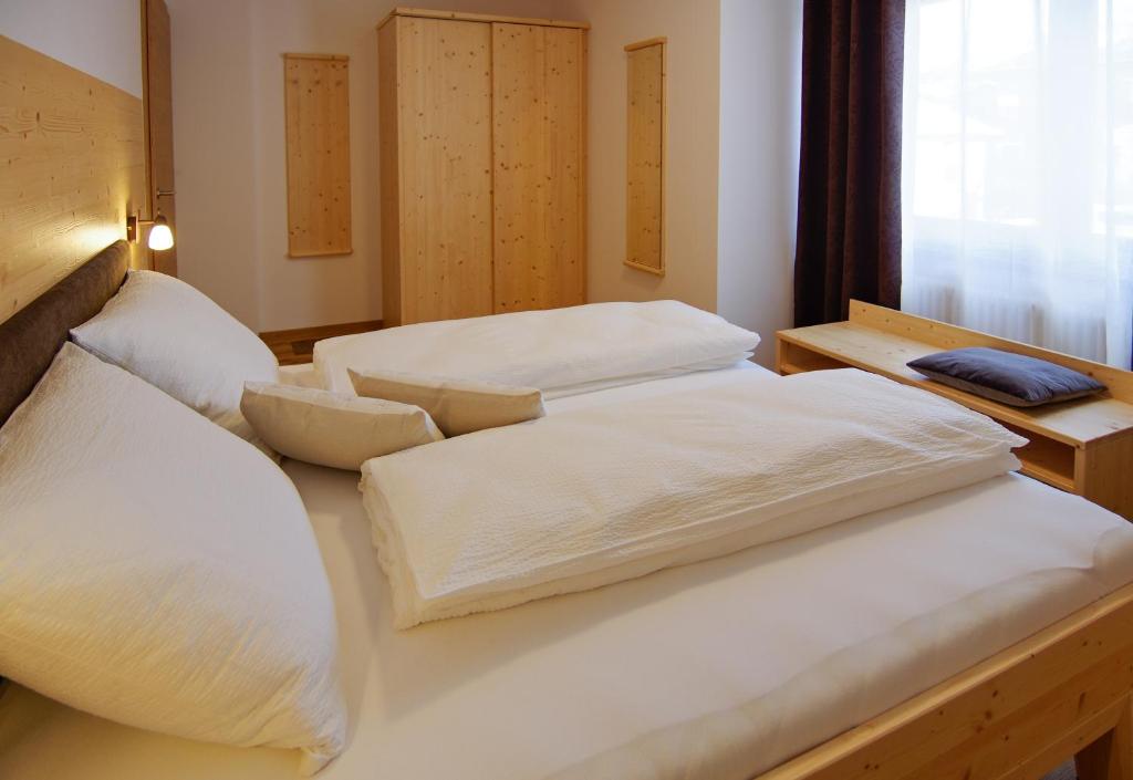 Postel nebo postele na pokoji v ubytování B&B Frühlingsheim