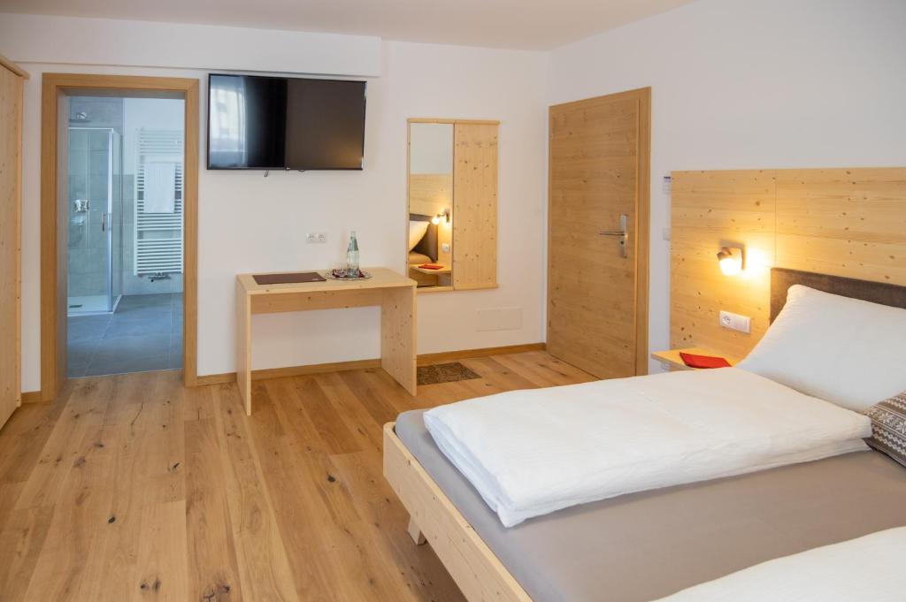 Postel nebo postele na pokoji v ubytování B&B Frühlingsheim