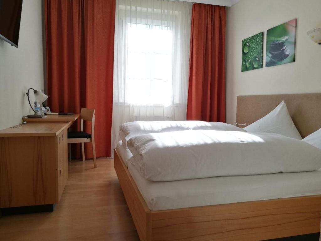 Posteľ alebo postele v izbe v ubytovaní Der Löwen, Löwen Betriebs- und Management GmbH
