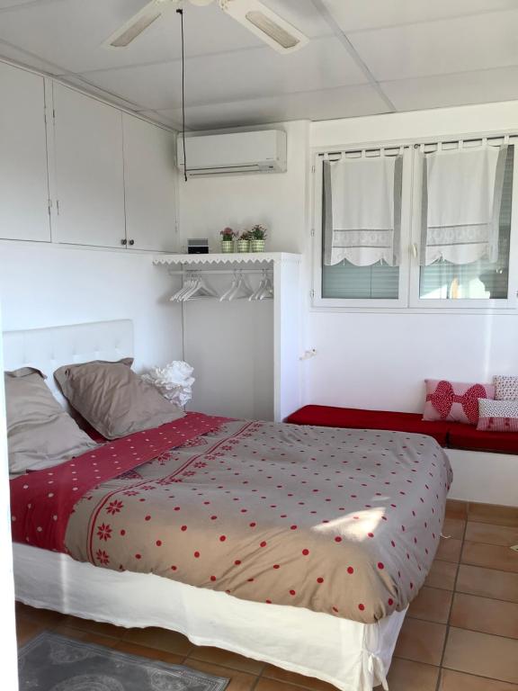 Ein Bett oder Betten in einem Zimmer der Unterkunft Les Grimaldines - Maison d&#39;Hôtes