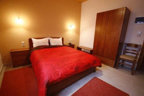 Posteľ alebo postele v izbe v ubytovaní Hotel Ilianna