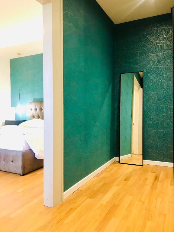 Łóżko lub łóżka w pokoju w obiekcie Room Verona Ai Conti