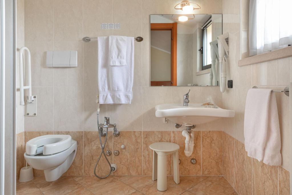Koupelna v ubytování Hotel Postumia