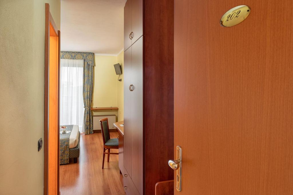 Posezení v ubytování Hotel Postumia