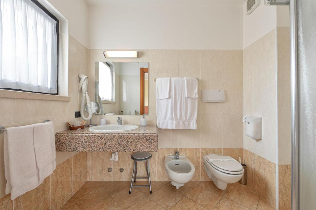 Koupelna v ubytování Hotel Postumia