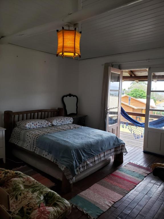  A casa é sua! Linda casa na praia do Rosa!