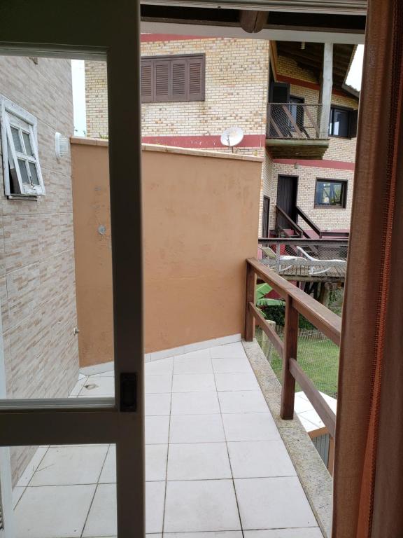  A casa é sua! Linda casa na praia do Rosa!