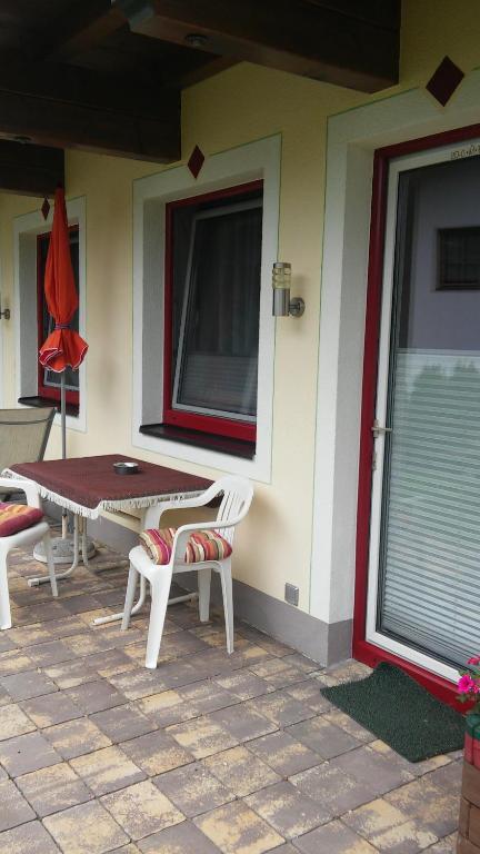 Patio alebo iná vonkajšia časť ubytovania Ferienwohnung Kogler