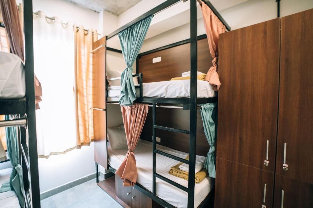Postel nebo postele na pokoji v ubytování Draper Startup House ,Koramangala