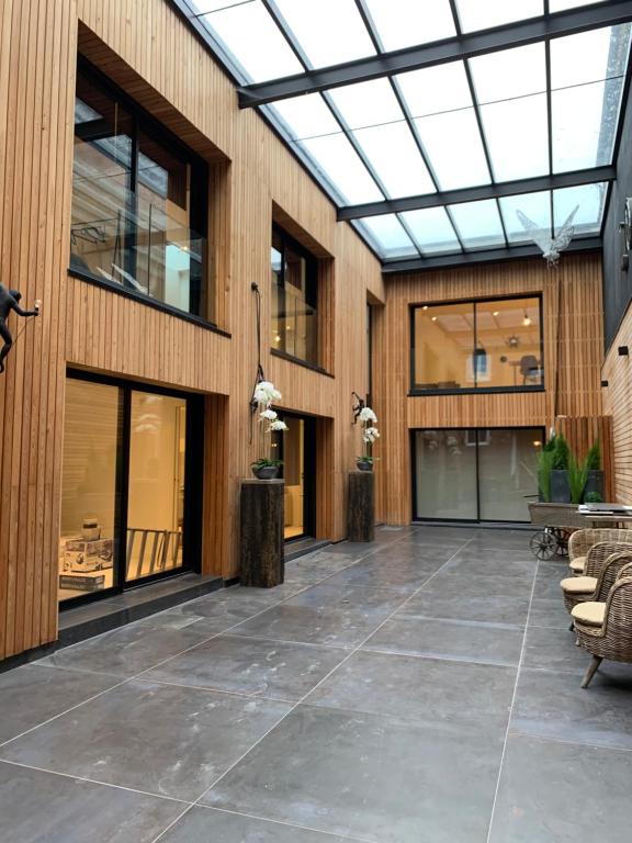 an empty lobby with a skylight in a building at Victoria's House in Lille