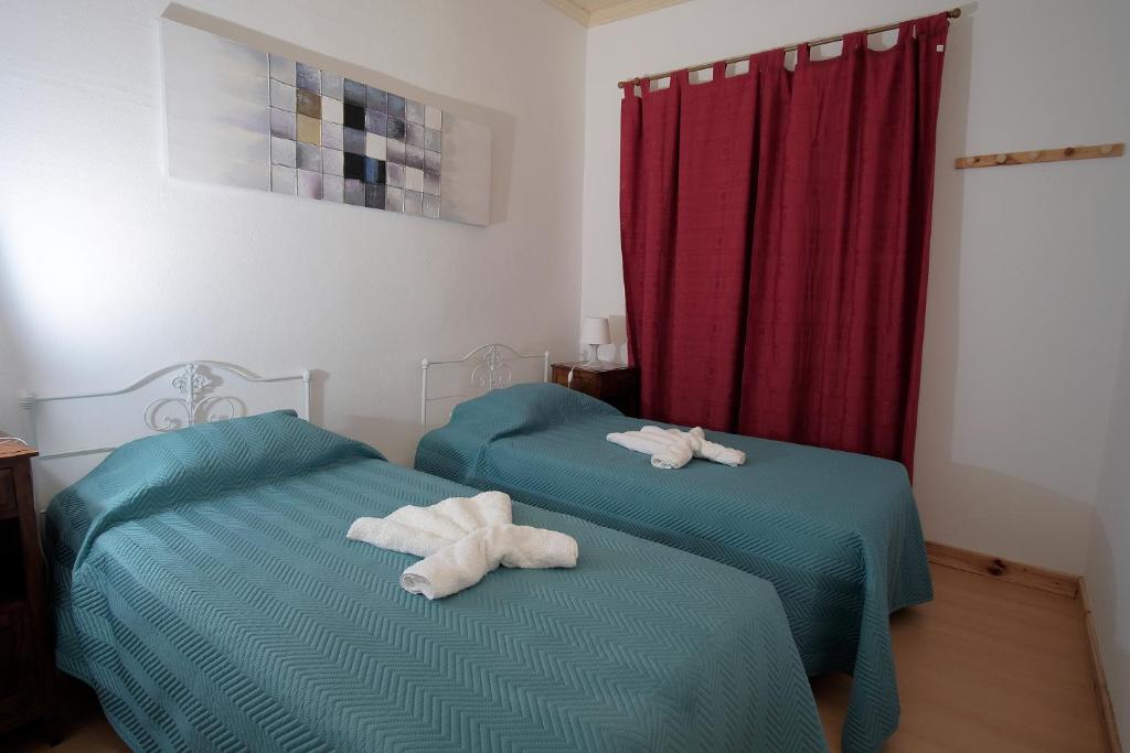Postel nebo postele na pokoji v ubytování Casa do Bica