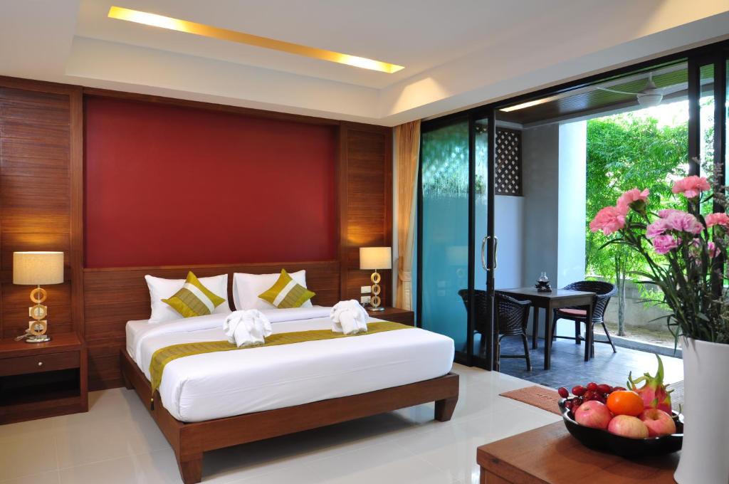 Postel nebo postele na pokoji v ubytování Samui Honey Tara Villa Residence