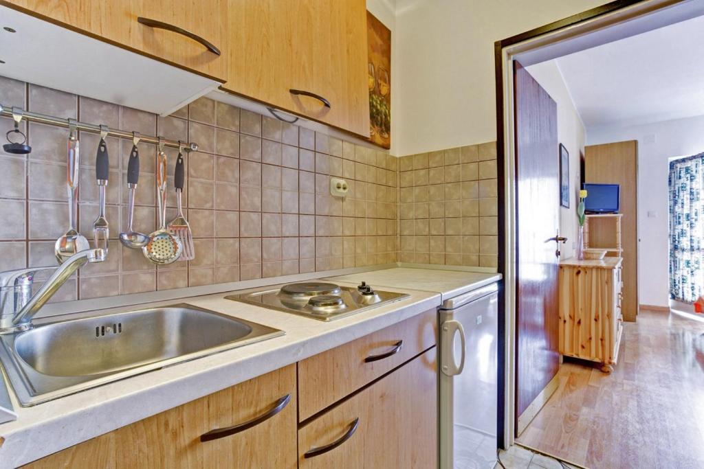 Kuchyňa alebo kuchynka v ubytovaní Beach Apartments Anton