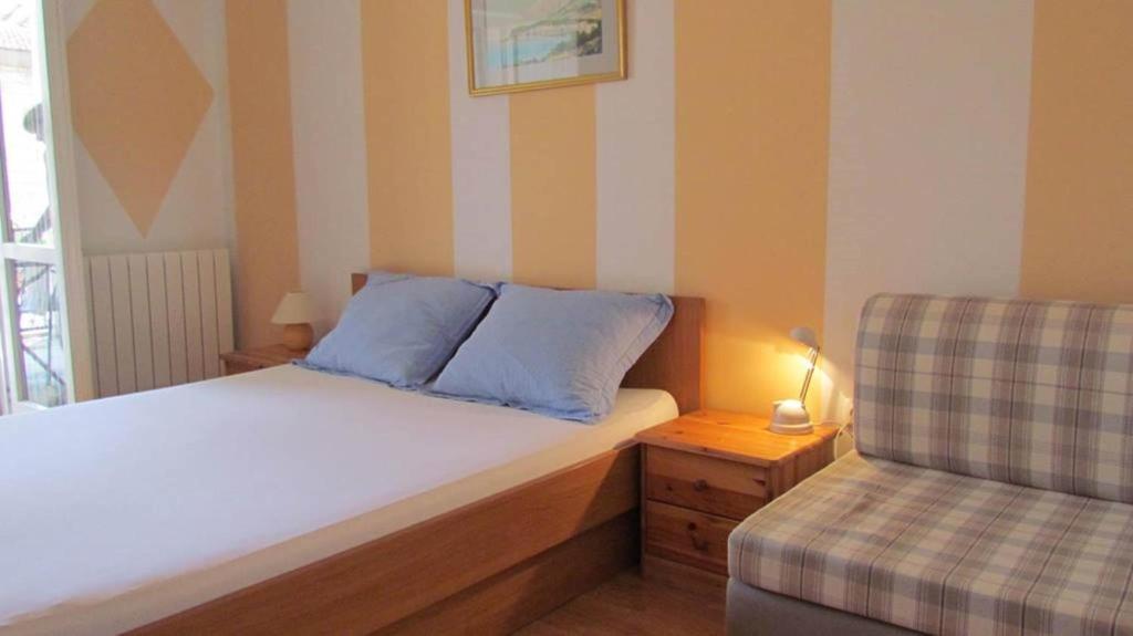 Posteľ alebo postele v izbe v ubytovaní Beach Apartments Anton