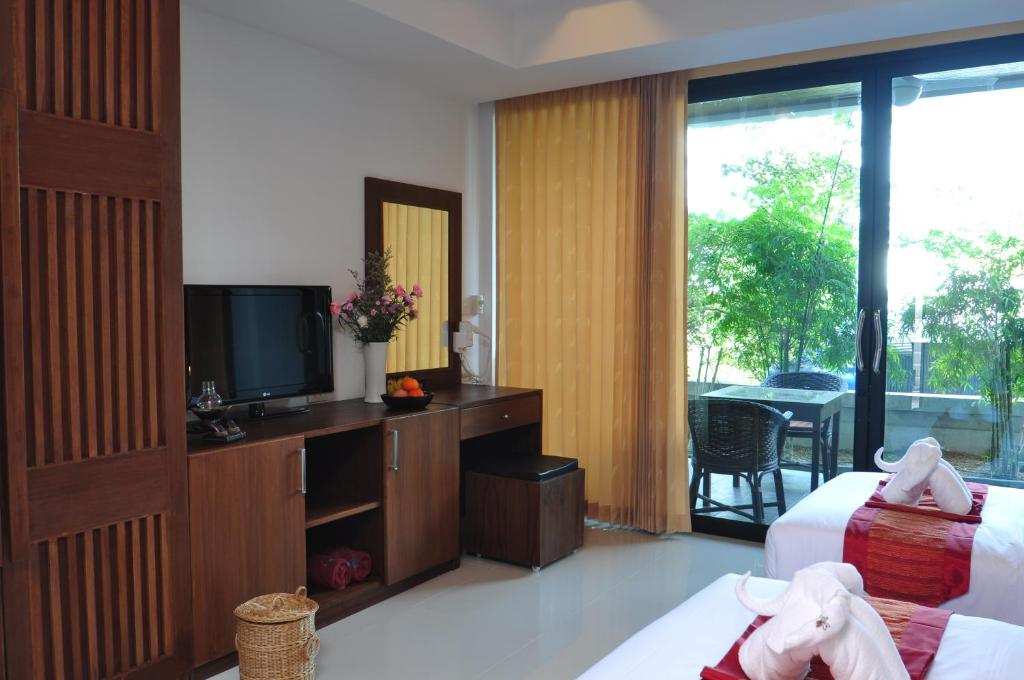 TV a/nebo společenská místnost v ubytování Samui Honey Tara Villa Residence
