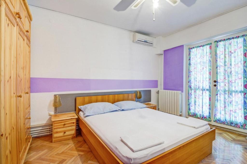 Posteľ alebo postele v izbe v ubytovaní Beach Apartments Anton