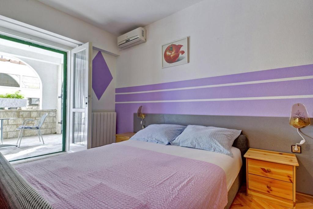 Posteľ alebo postele v izbe v ubytovaní Beach Apartments Anton