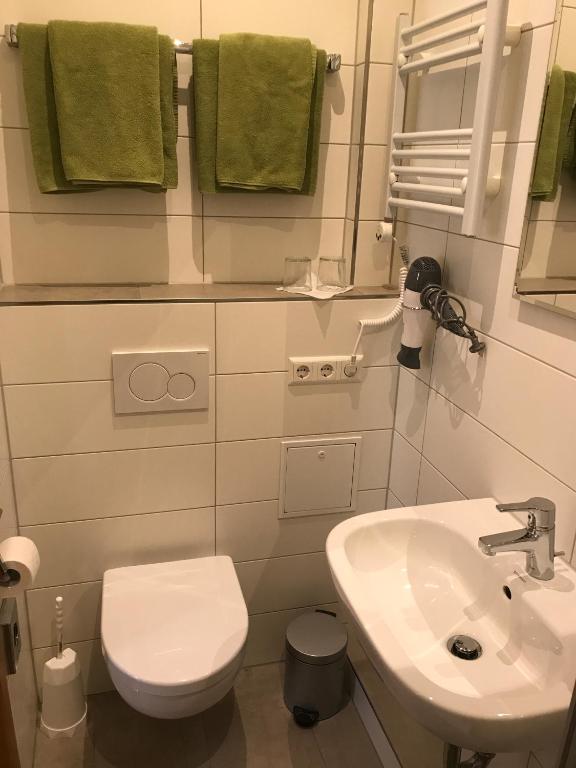 Koupelna v ubytování Hotel und Wirtshaus Löwen