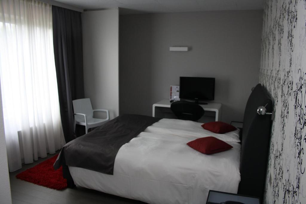 Voodi või voodid majutusasutuse Hotel Panorama toas