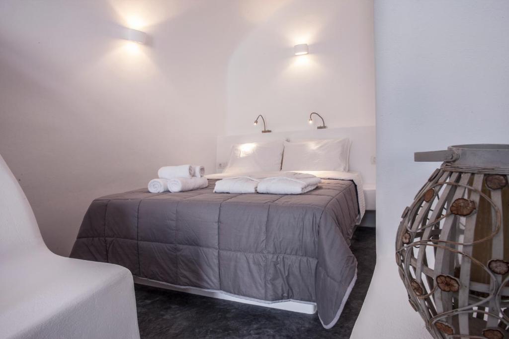 Postel nebo postele na pokoji v ubytování Cupola Suites