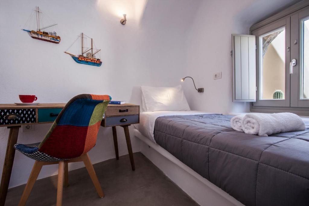 Postel nebo postele na pokoji v ubytování Cupola Suites