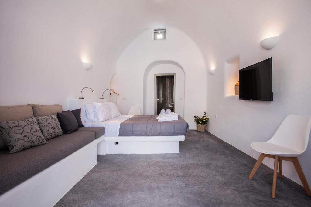 TV a/nebo společenská místnost v ubytování Cupola Suites