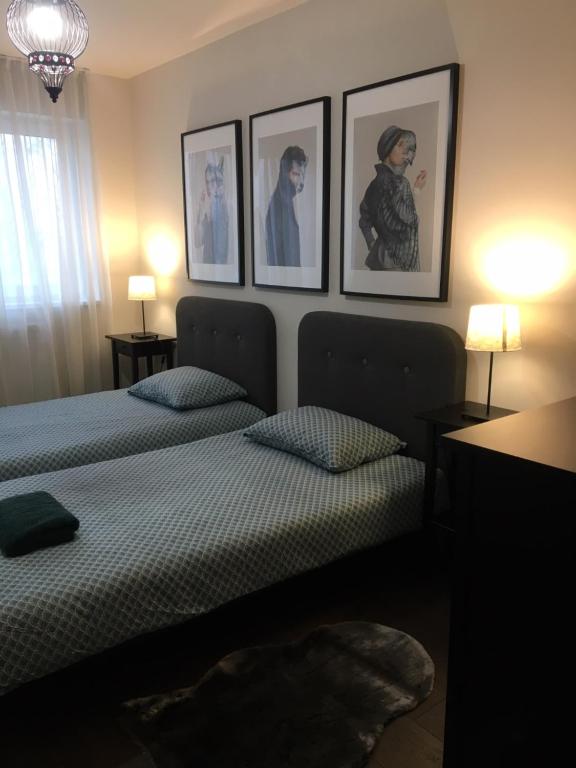 Łóżko lub łóżka w pokoju w obiekcie Thermal Forest Apartment