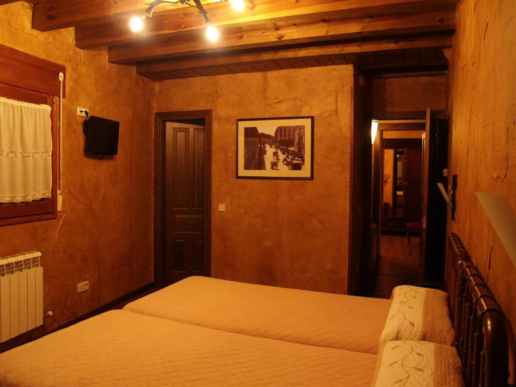 Posteľ alebo postele v izbe v ubytovaní La Casona del Herrero