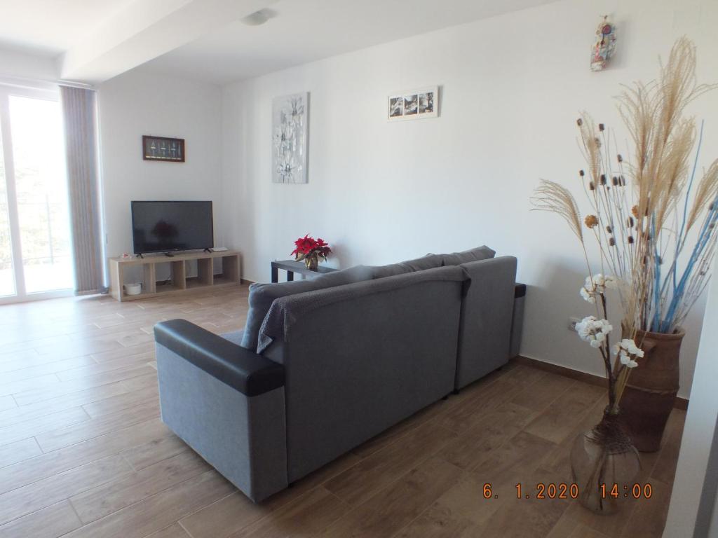 TV a/nebo společenská místnost v ubytování Apartments More
