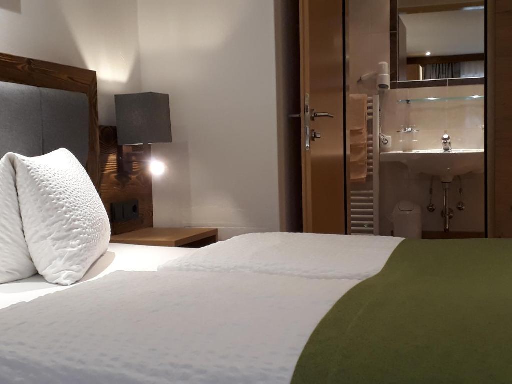 Postel nebo postele na pokoji v ubytování Denggnhof