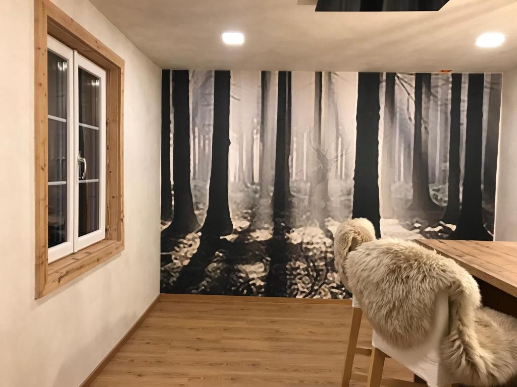 Łóżko lub łóżka w pokoju w obiekcie Bergchalet Hinterstoder