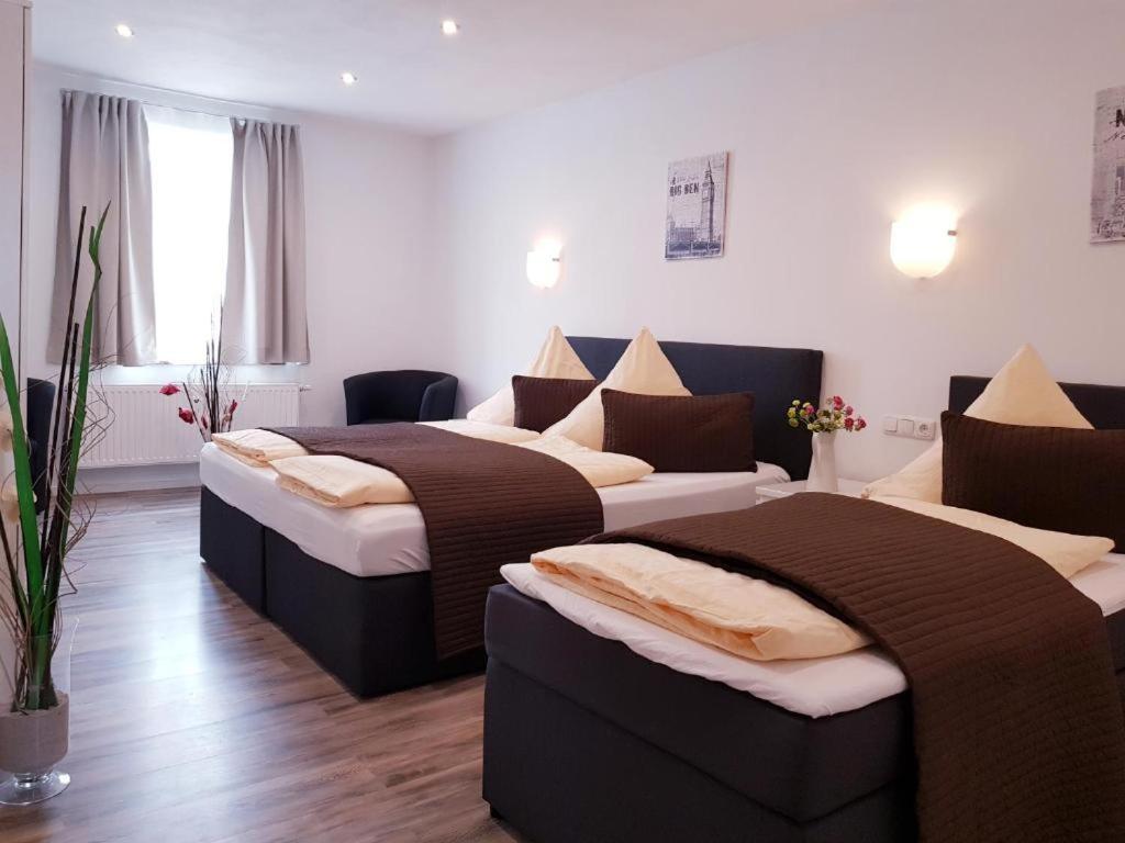 Postel nebo postele na pokoji v ubytování Füssen Apartments - Center Apartments